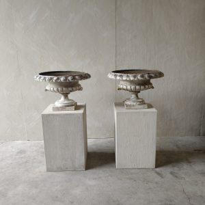 Large pair of cast iron vases